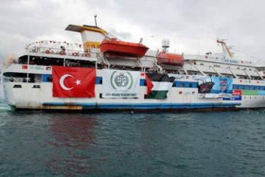 epa02178114 A handout photograph supplied by the Free Gaza Movement on 29 May 2010 shows one of the activist's vessels decked out in flags of Turkey and Palestine as it sets sail on 22 May 2010 from Turkey as part of a peace flotilla of some 8 ships intending to carry some 800 activists and 10,000 tons of supplies to the Palestinians in the Gaza Strip,