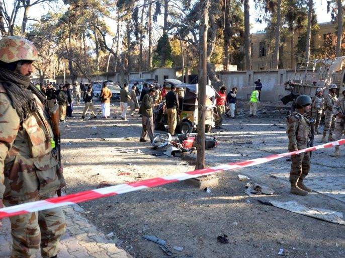 Security officials inspect the scene of a bomb blast in Quetta, the provincial capital of restive Balochistan province, Pakistan, 06 February 2016. At least 10 people were killed and nine others injured when a bomb planted on a roadside exploded in Quetta, apparently targeting the paramilitary Frontier Corps.