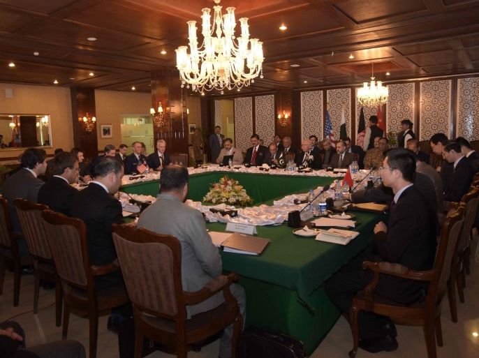 A handout picture released by Associated Press of Pakistan (APP) shows Pakistan's National Security Advisor Sartaj Aziz (L) presiding the third round of four-way peace talks meeting with Afghanistan, US and Chinese delegates in Islamabad, Pakistan, 06 February 2016. Others are not identified. Talks involving Afghanistan, China, Pakistan and the United States were underway on Saturday in Islamabad to finalize a plan for talks between Afghan government and Taliban insurgents. Pakistani foreign affairs advisor Sartaj Aziz said it would 'focus on the early adoption of a roadmap for the reconciliation process and identify the way forward for holding direct peace talks between the representatives of the government of Afghanistan and Taliban groups as early as possible'. EPA/ASSOCIATED PRESS OF PAKISTAN/HANDOUT