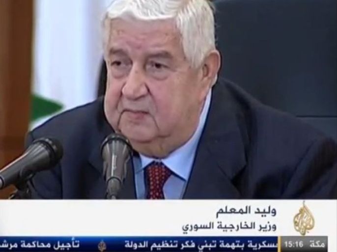 وزير الخارجية السوري وليد المعلم في مؤتمر صحفي بدمشق